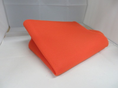 Air mesh in einem mittlerem orange.